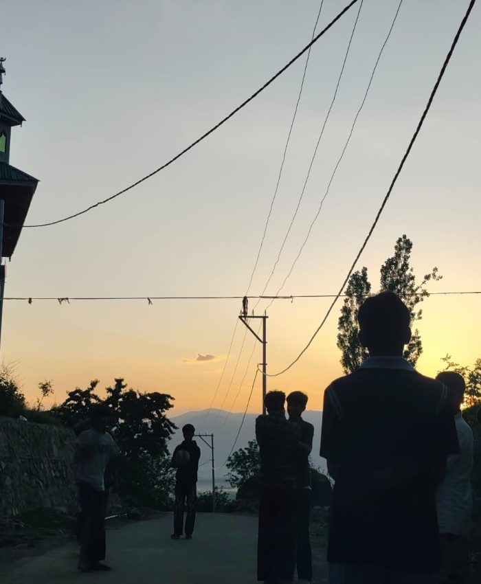 THE NET IS A LIE:In Bandipora’s Chanpal, a frayed rope divides a road into a volleyball court